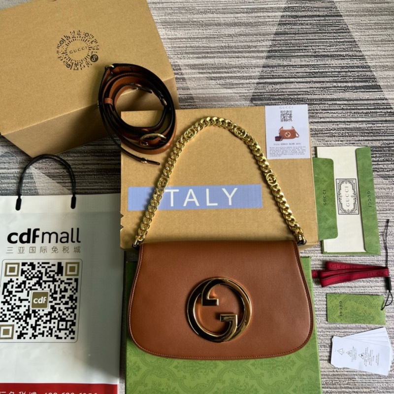 G*u*i top handle bags